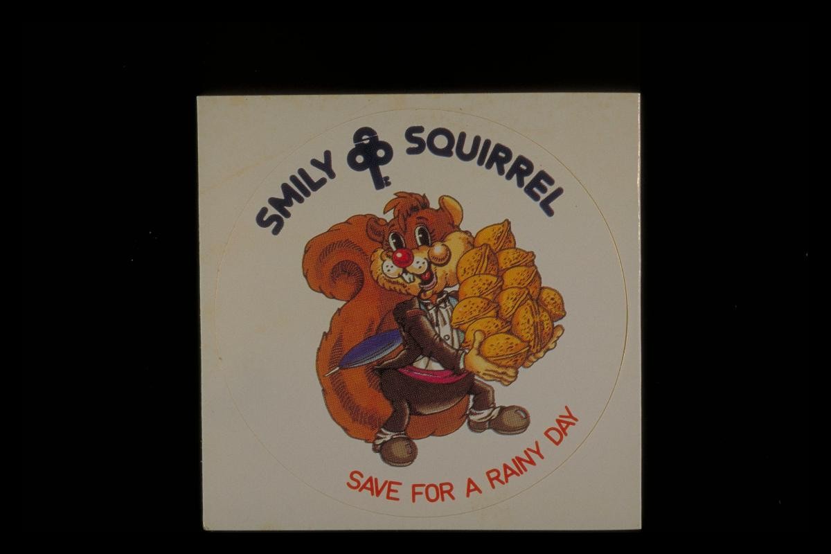 ‘Smiley Squirrel’ sticker with slogan, ‘Save for a rainy day’