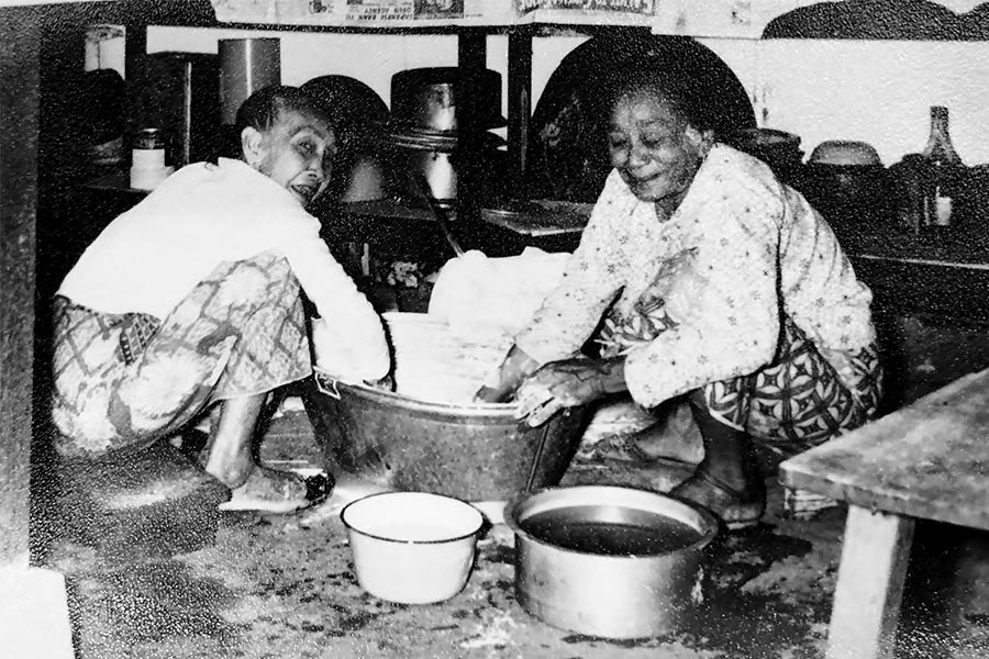 <a class="bold" href="/assets/99eec581-af27-44bf-b933-6a97e5d96468/papathy-pillay-and-a-relative.jpg" target="_blank">
A photograph of Papathy Pillay and a relative in the kitchen at their Kampong Batak residence
</a>