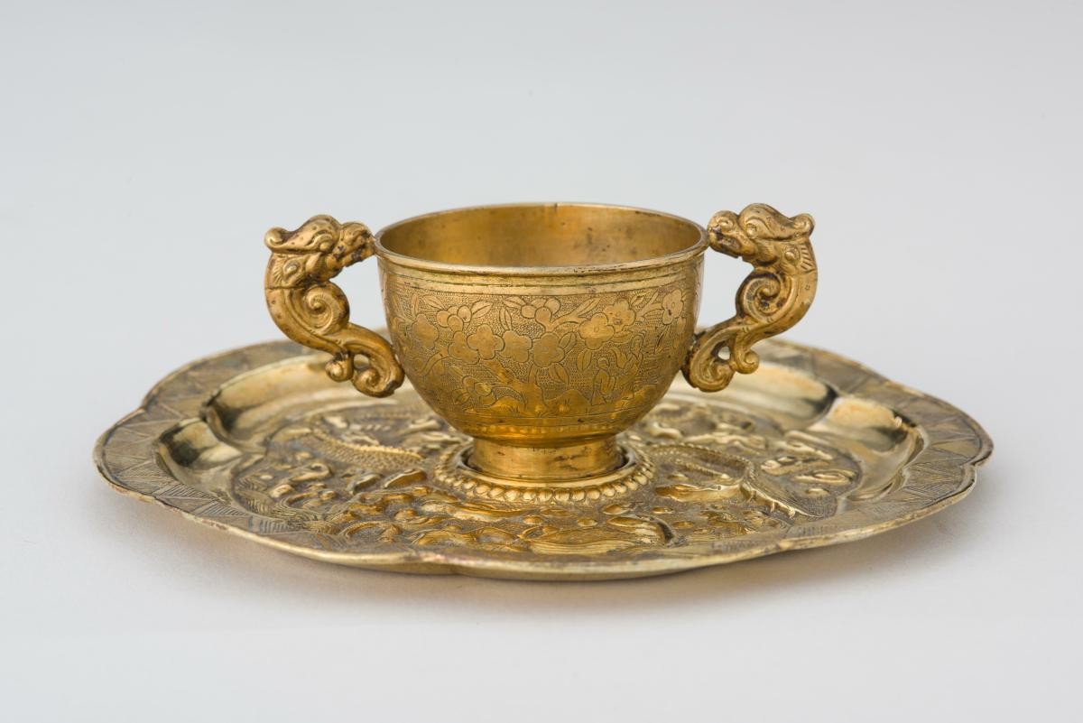 Cup with saucer
