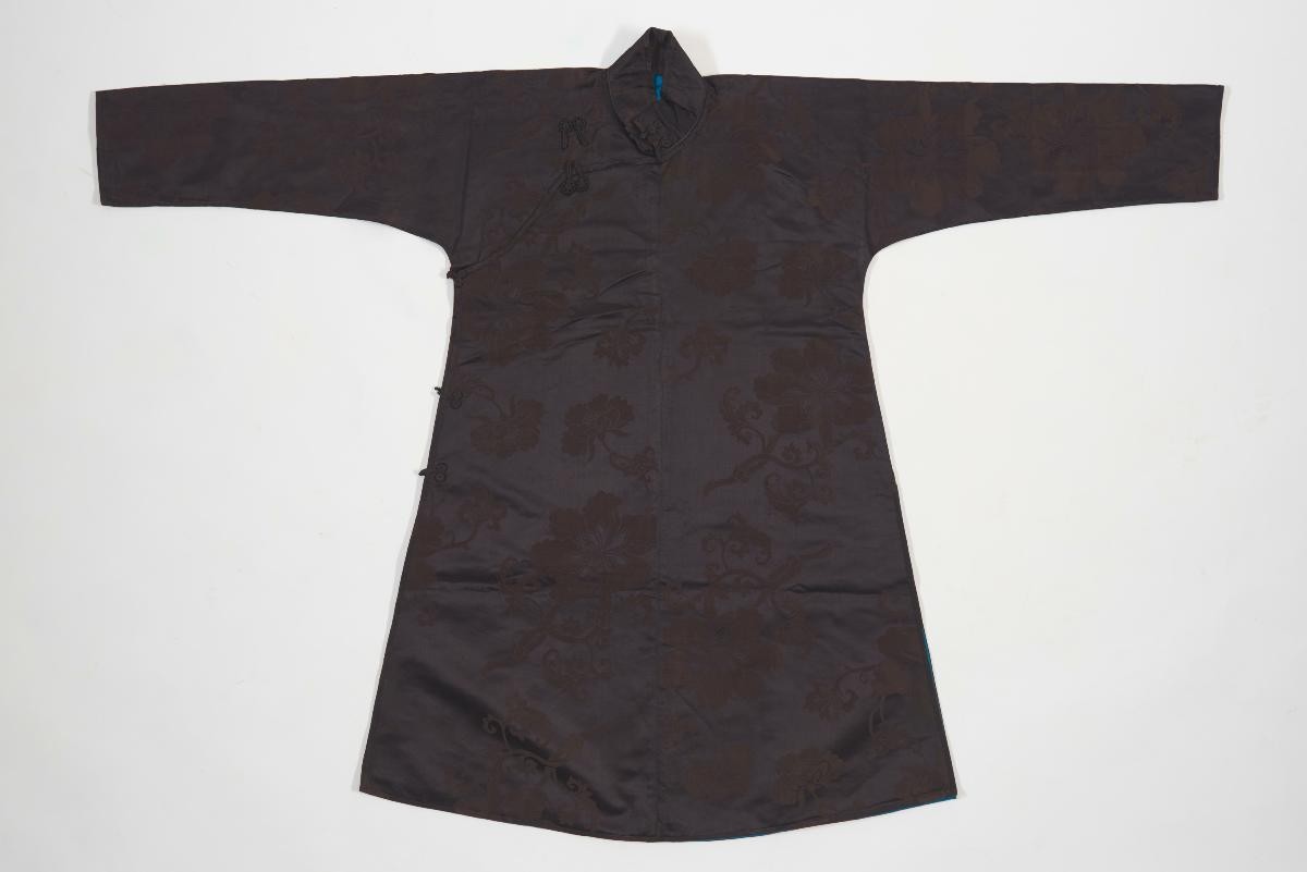 Woman’s maroon silk long gown (Cheongsam) with floral motif and turquoise lining