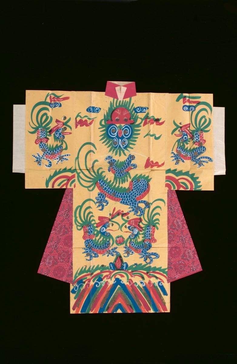 Api Robe A paper robe with patterns