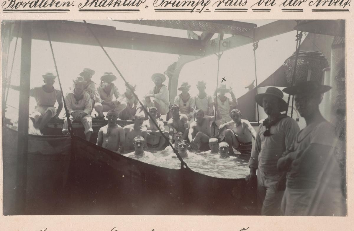 German sailors relaxing in their ship’s swimming pool