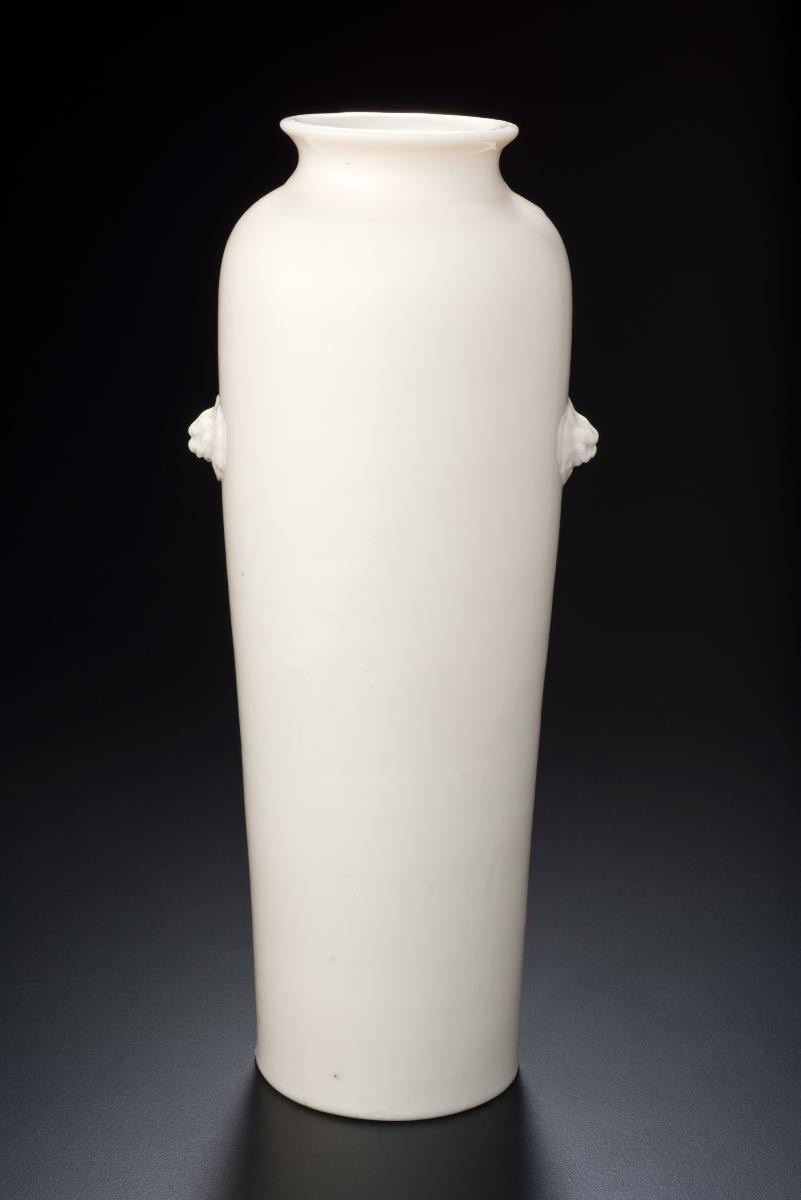 Sleeve vase with lion masks