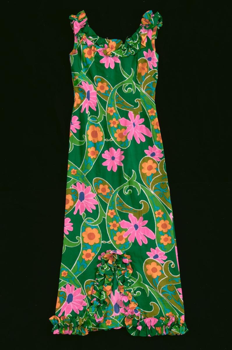 A sleeveless floral maxi dress with frills