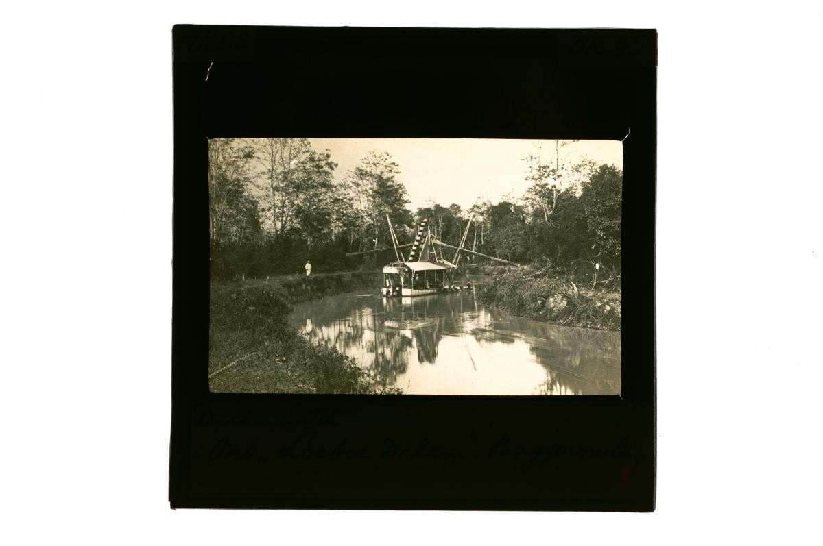 A glass lantern slide depicting a river scene